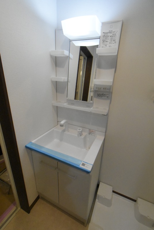 ��ʌ��������܎s�k��~�͒��̃A�p�[�g�̐��ʏ�