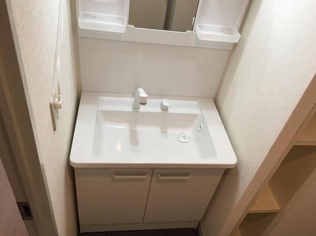 ��ʌ��������܎s����厚�w��̃}���V�����̐��ʏ�