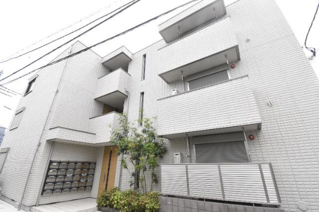 ��ʌ��������܎s��{����ؒ��Q����409�̃}���V�����̌����O��