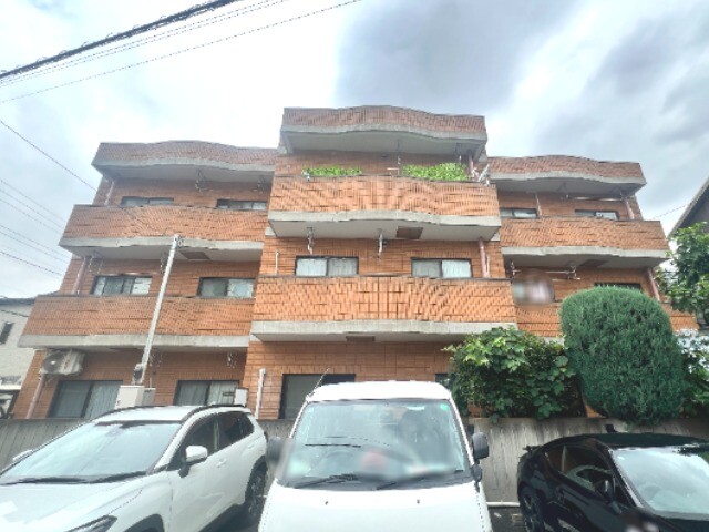 ��ʌ��������܎s�k��{�����̃}���V�����̌����O��