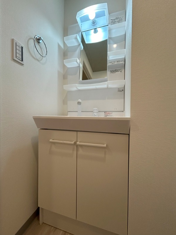 ��ʌ��������܎s��{����ؒ��S���ڂ̃}���V�����̐��ʏ�