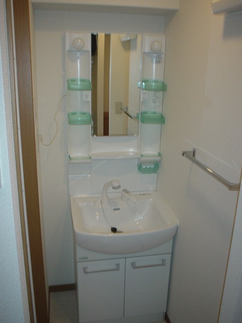 ��ʌ�����s�����R���ڂ̃}���V�����̐��ʏ�