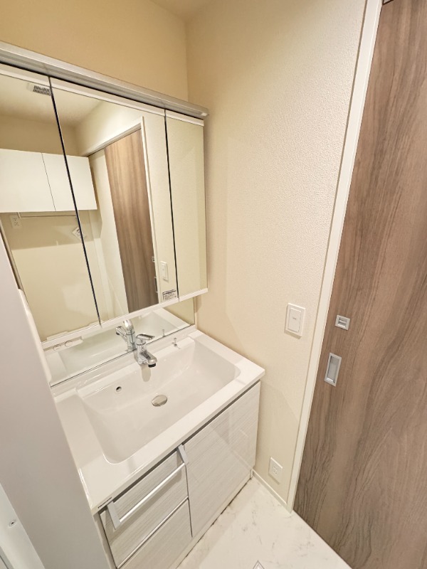 ��ʌ��������܎s��{�捂�@���P���ڂ̃}���V�����̐��ʏ�