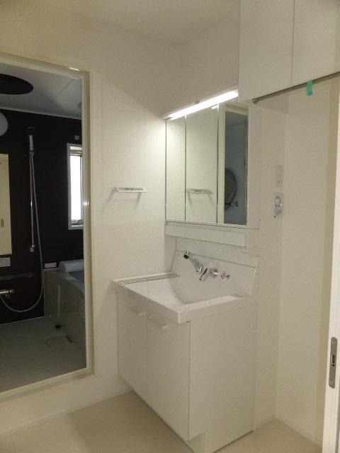 ��ʌ�����s�̉ƂP���ڂ̃A�p�[�g�̐��ʏ�