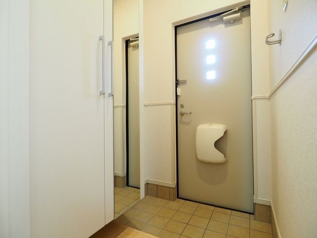 ��ʌ������s���U���ڂ̃A�p�[�g�̌���