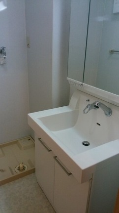 ��ʌ�����s�厚�����̃A�p�[�g�̐��ʏ�