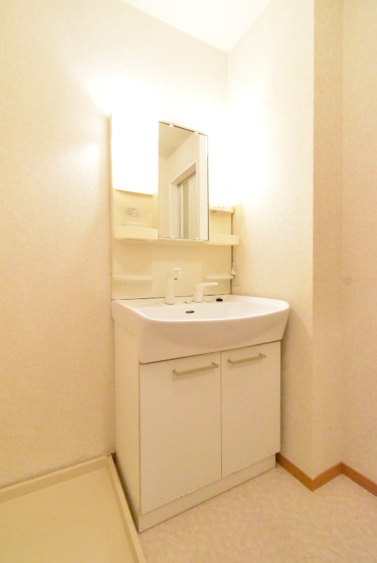 ��ʌ��z�J�s���������̃A�p�[�g�̐��ʏ�