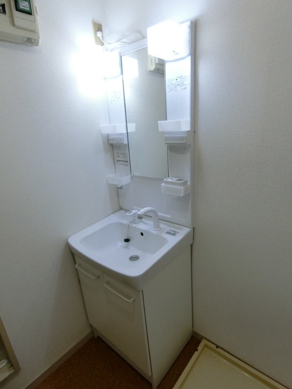 ��ʌ�����s�˒˓��P���ڂ̃}���V�����̐��ʏ�