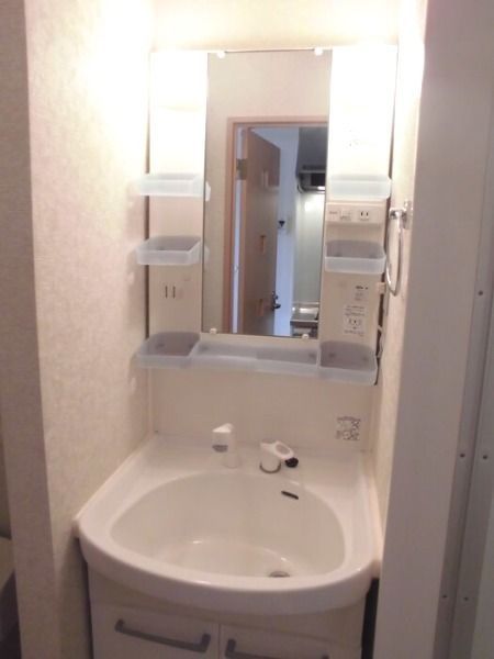 ��ʌ��z�J�s�Ɍ��P���ڂ̃A�p�[�g�̐��ʏ�