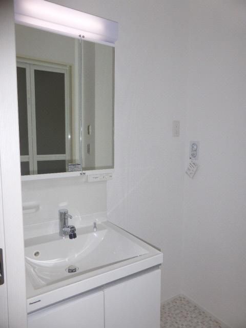 ��ʌ������s�����Q���ڂ̃A�p�[�g�̐��ʏ�