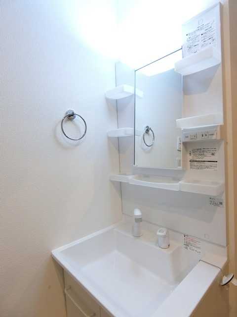 ��ʌ��������܎s��{����ؒ��P���ڂ̃}���V�����̐��ʏ�