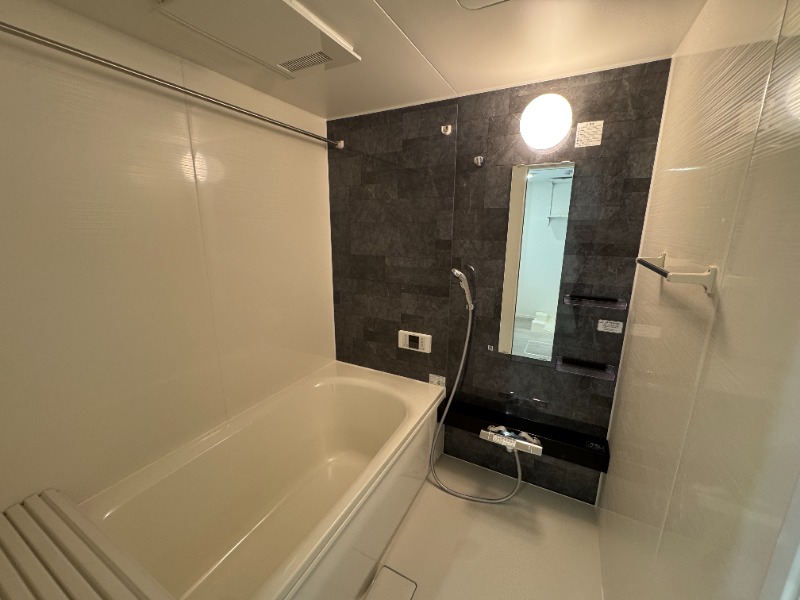 ��ʌ�����s�݉ƒ��̃A�p�[�g�̃o�X