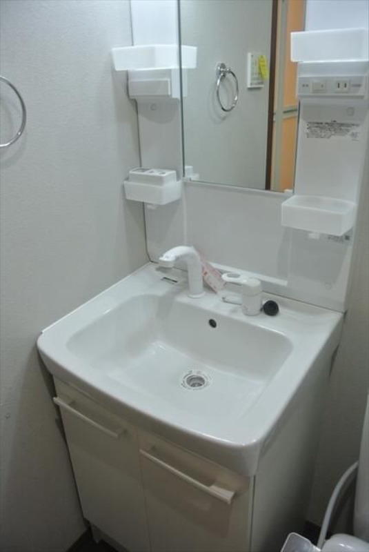 ��ʌ��������܎s�Y�a�挳���P���ڂ̃A�p�[�g�̐��ʏ�