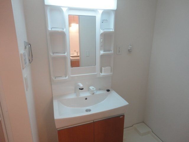 ��ʌ�����s�씵���J�T���ڂ̃A�p�[�g�̐��ʏ�