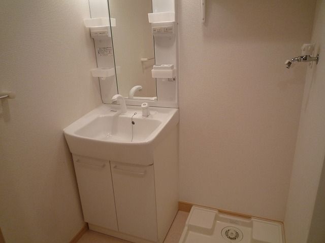 ��ʌ�����s�핽�Q���ڂ̃}���V�����̐��ʏ�