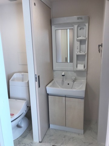 ��ʌ�����s�厚�Ԉ�̃A�p�[�g�̐��ʏ�