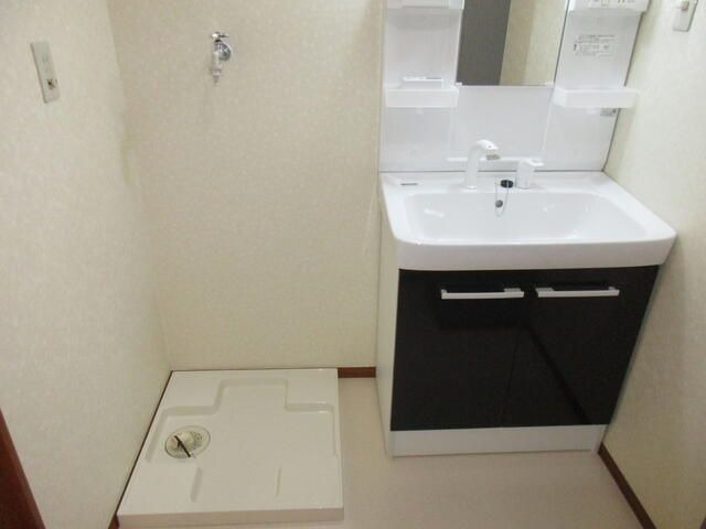 ��ʌ��@�c�s�厚���l�̃A�p�[�g�̐��ʏ�