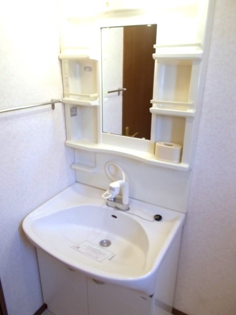 ��ʌ�����s�厚�����̃A�p�[�g�̐��ʏ�