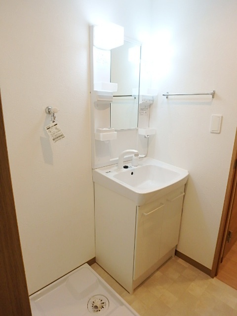 ��ʌ��������܎s��{����ؒ��P���ڂ̃}���V�����̐��ʏ�