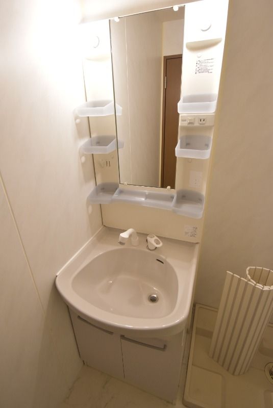 ��ʌ��������܎s�k����i���Q���ڂ̃A�p�[�g�̐��ʏ�