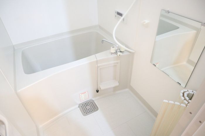 ��ʌ�����s������U���ڂ̃A�p�[�g�̃o�X