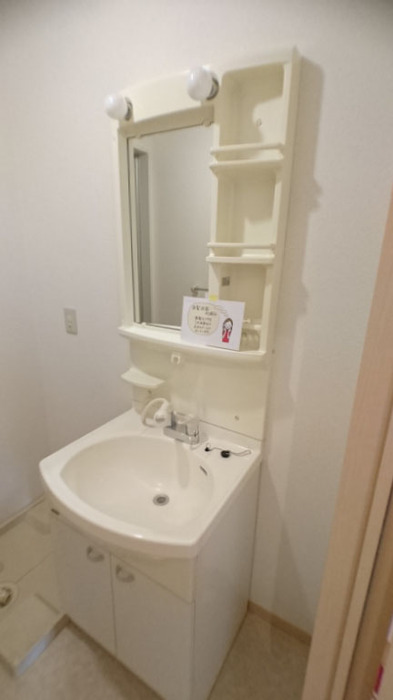 ��ʌ�����s������U���ڂ̃A�p�[�g�̐��ʏ�