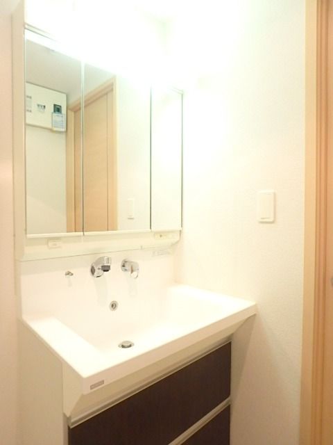 ��ʌ��������܎s�k��{�����P���ڂ̃}���V�����̐��ʏ�