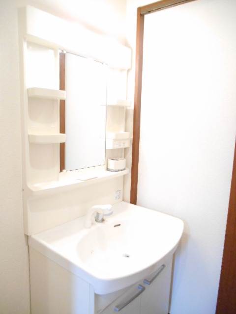 ��ʌ��������܎s�k��~�͒��̃A�p�[�g�̐��ʏ�