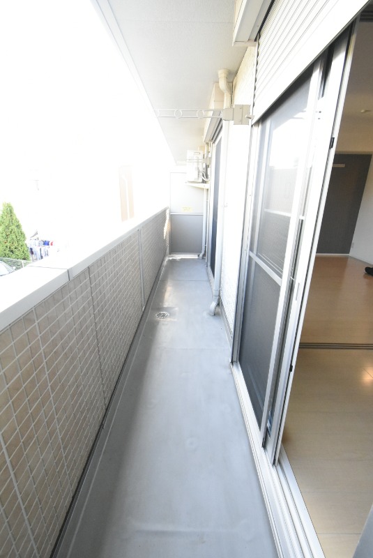 ��ʌ��������܎s�k��{�����̃A�p�[�g�̃o���R�j�[