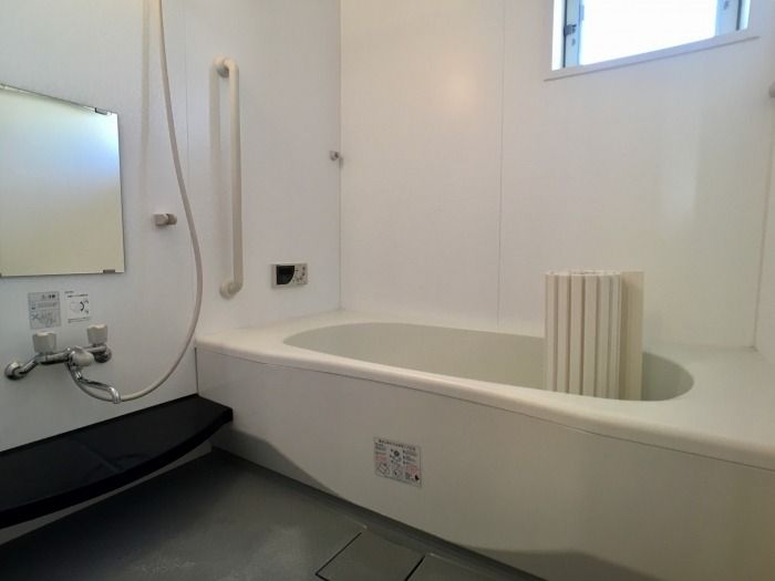 ��ʌ�����s�{���U���ڂ̃A�p�[�g�̃o�X