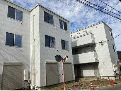 ��ʌ��������܎s����{�O���̃}���V�����̌����O��