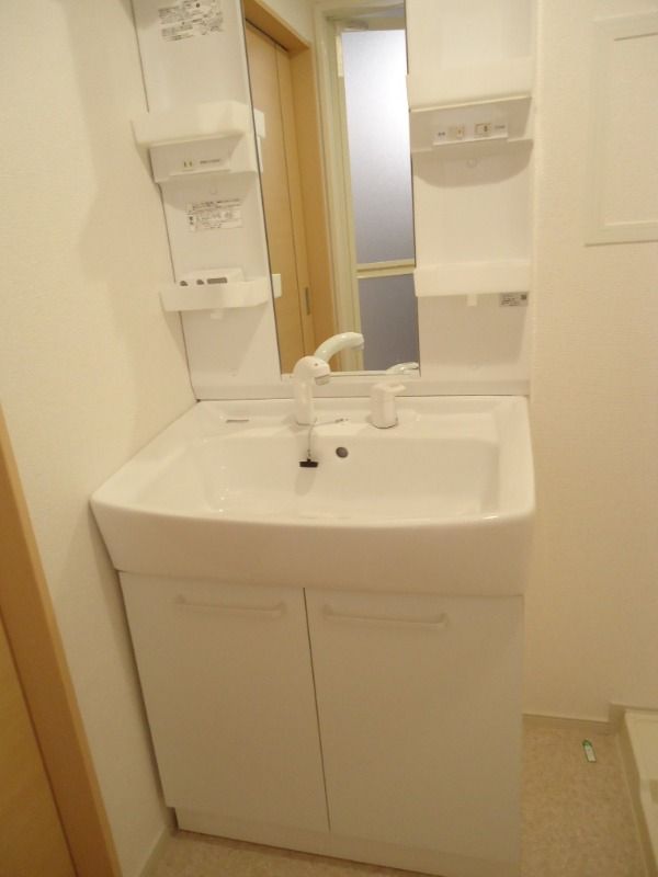 ��ʌ��������܎s�k��{�����̃A�p�[�g�̐��ʏ�