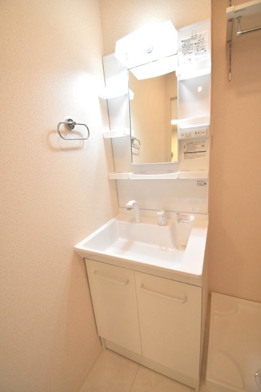 ��ʌ��������܎s��{��㏬���̃A�p�[�g�̐��ʏ�