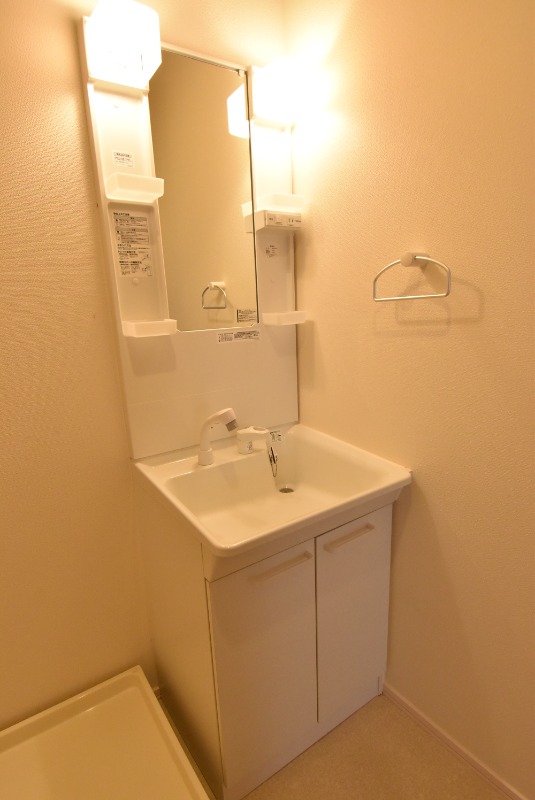 ��ʌ�����s���؂R���ڂ̃}���V�����̐��ʏ�