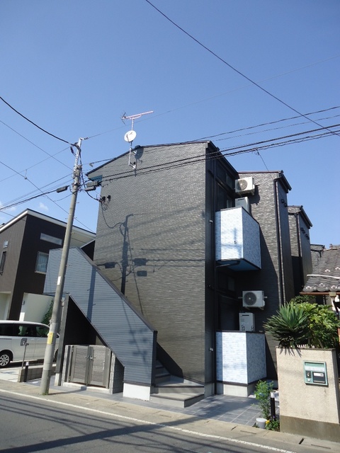 ��ʌ��������܎s�k��{�����̃A�p�[�g�̌����O��