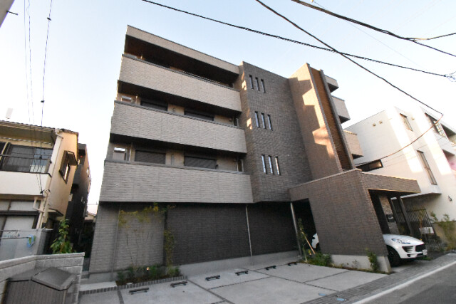 ��ʌ��������܎s��{����ؒ��S���ڂ̃}���V�����̌����O��