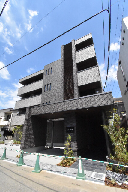 ��ʌ��������܎s��{����ؒ��S���ڂ̃}���V�����̌����O��