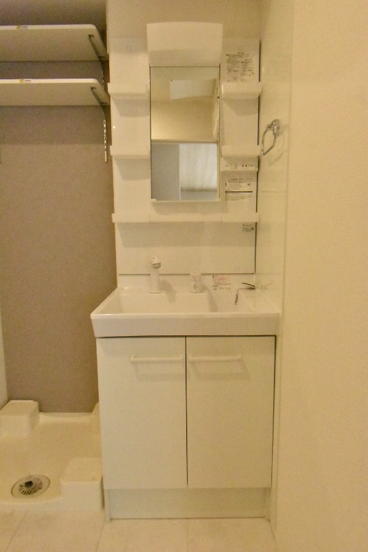 ��ʌ������s�V�����X���ڂ̃A�p�[�g�̐��ʏ�