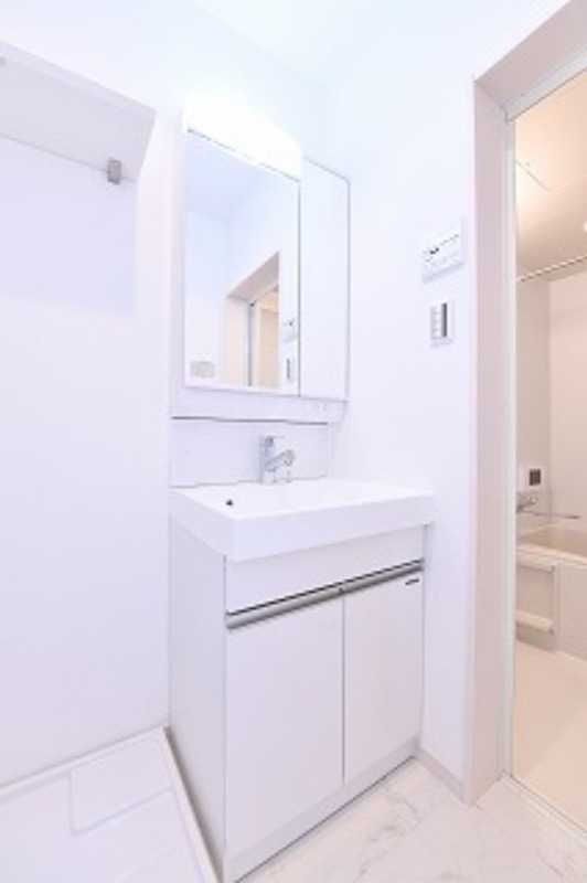 ��ʌ��@�c�s�������̃A�p�[�g�̐��ʏ�