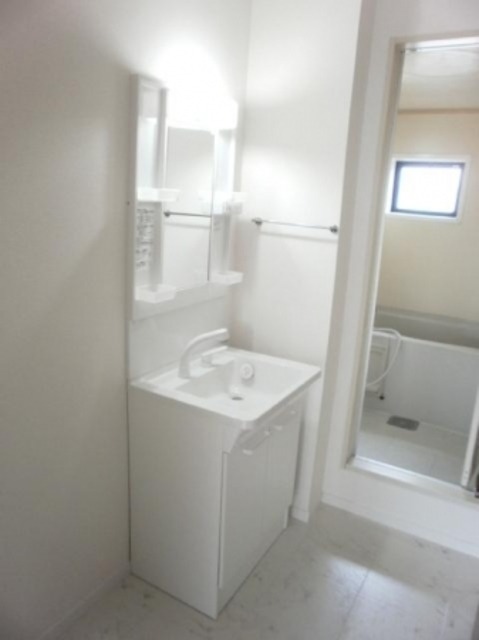 ��ʌ��k�����S�ɓޒ��厚��j�̃A�p�[�g�̐��ʏ�