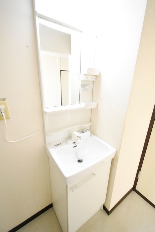 ��ʌ��������܎s��΋戤�����̃A�p�[�g�̐��ʏ�