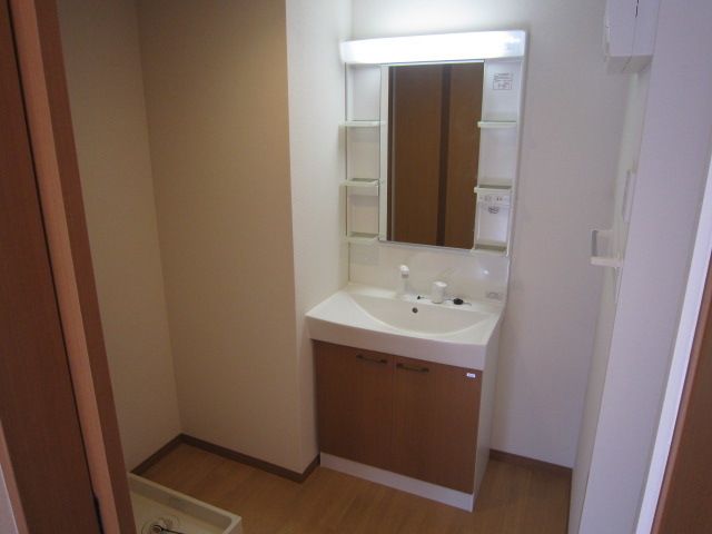 ��ʌ��z�J�s�V�z�J�Q���ڂ̃A�p�[�g�̐��ʏ�