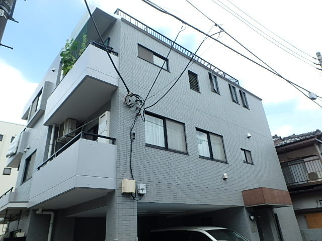 ��ʌ��������܎s��{��听���P����130�̃}���V�����̌����O��