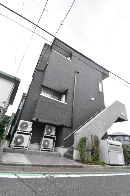 ��ʌ��������܎s�k��{�����̃A�p�[�g�̌����O��