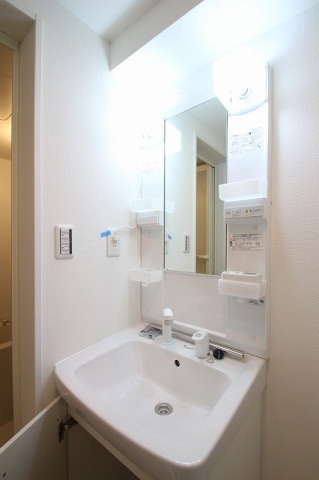 ��ʌ��������܎s�k��{�����̃A�p�[�g�̐��ʏ�