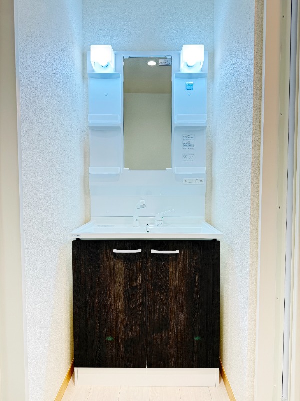 ��ʌ�����s�O��P���ڂ̃}���V�����̐��ʏ�