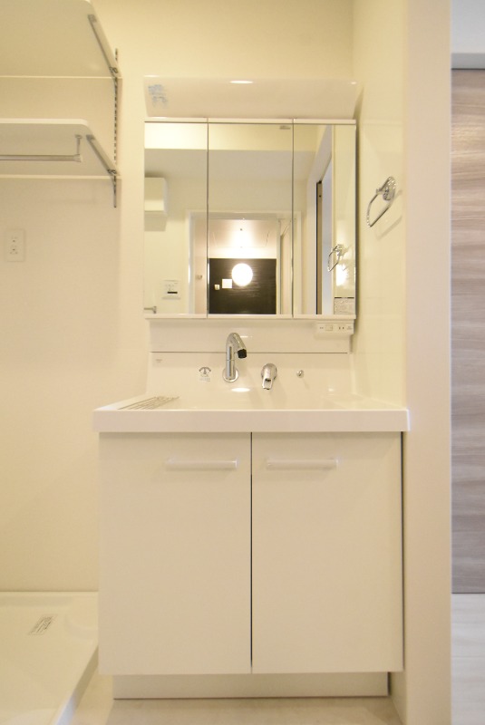 ��ʌ��������܎s��΋���K���̃A�p�[�g�̐��ʏ�