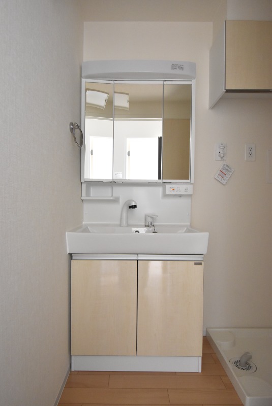 ��ʌ�����s�厚�����̃A�p�[�g�̐��ʏ�