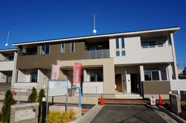 ��ʌ�����s��c�{�̃A�p�[�g�̌����O��