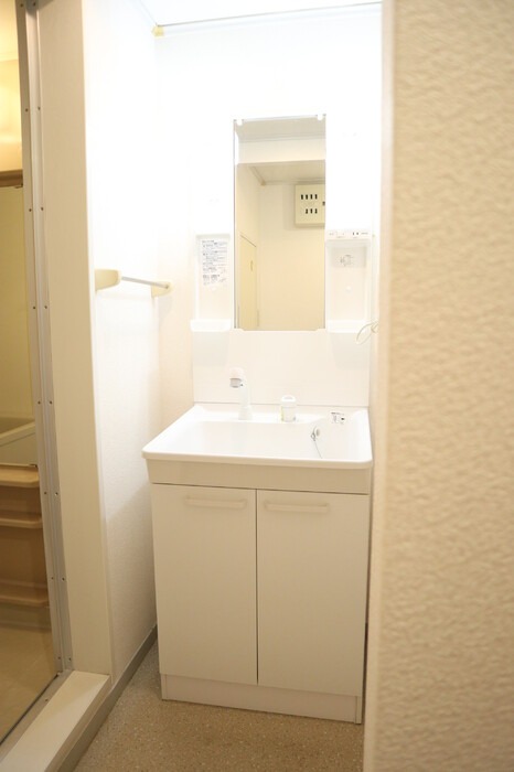 ��ʌ�����s������U���ڂ̃A�p�[�g�̐��ʏ�